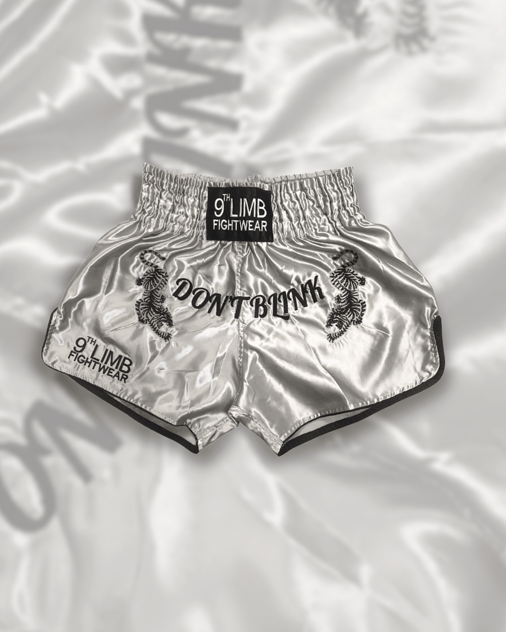 Grey 9th Limb “Don’t Blink” Muay Thai Shorts – Satin Fightwear - 9thLimbHQ