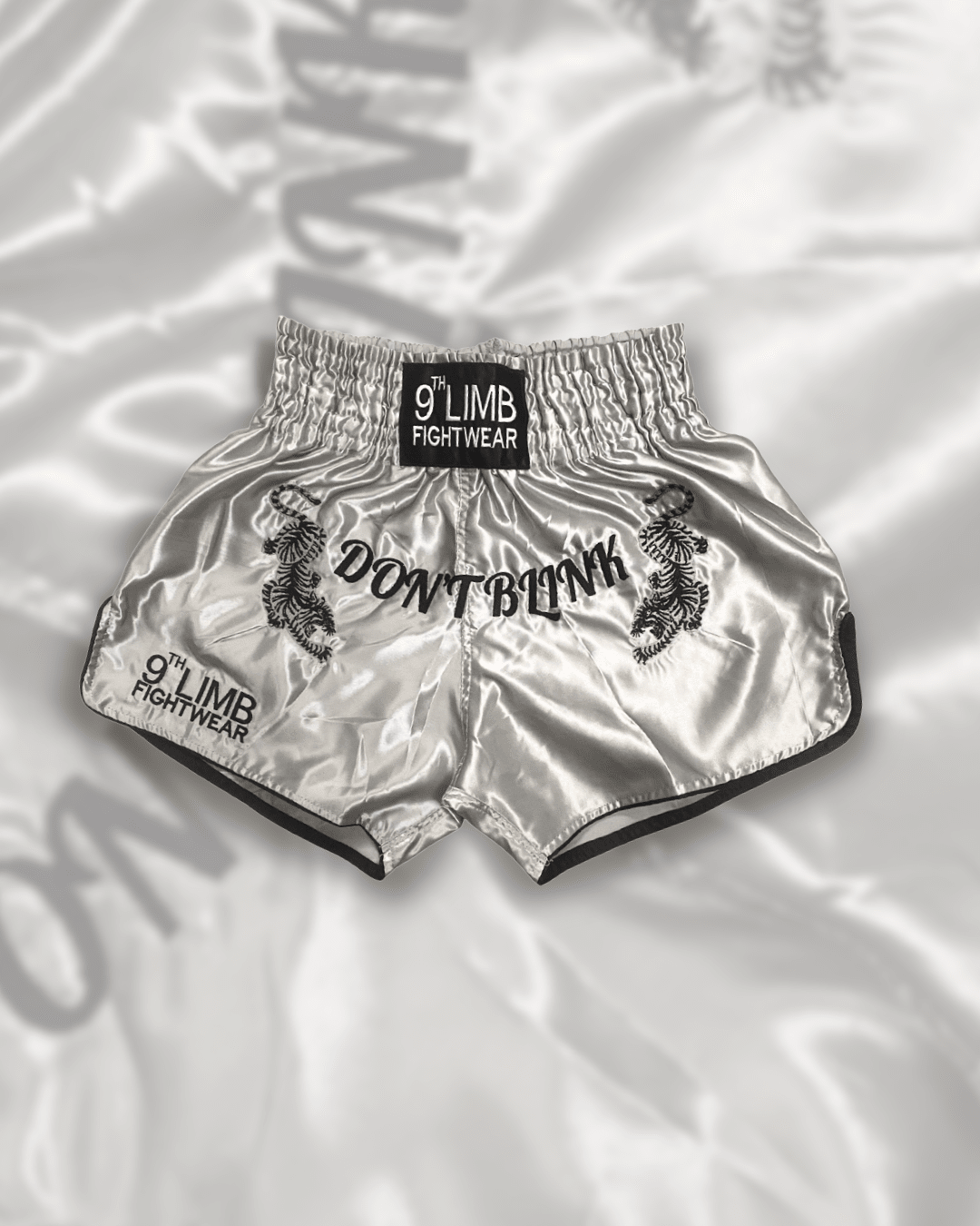 Grey 9th Limb “Don’t Blink” Muay Thai Shorts – Satin Fightwear - 9thLimbHQ